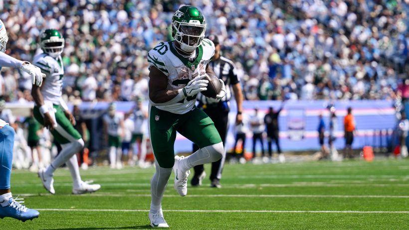 Breece Hall runs for a TD versus the Titans.