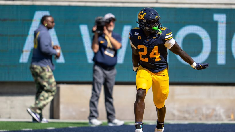 Adam Mohammed celebrates a touchdown vs Wagner.