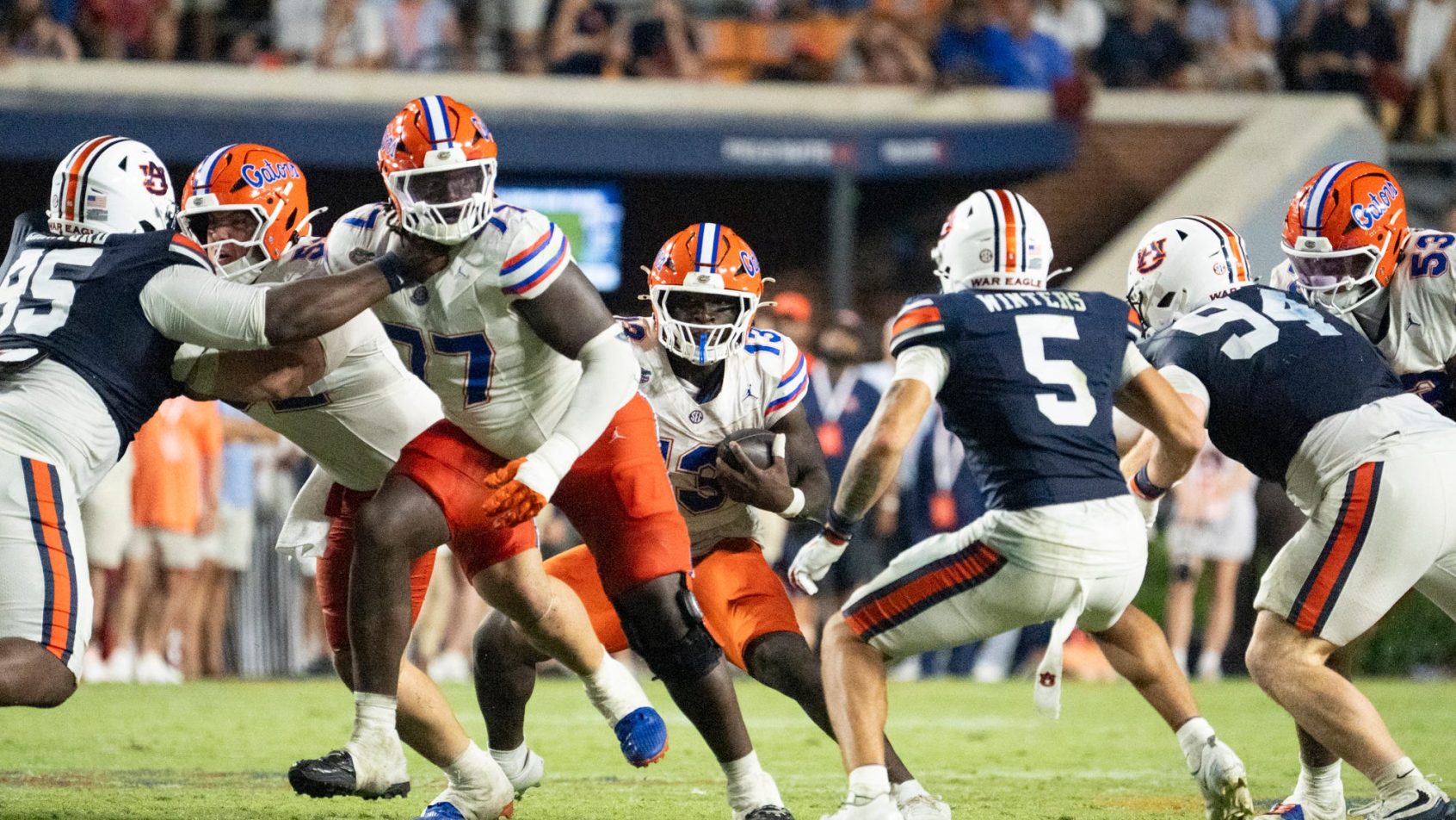 Florida running back Jadan Baugh carries the ball against Auburn