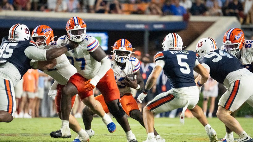 Florida running back Jadan Baugh carries the ball against Auburn