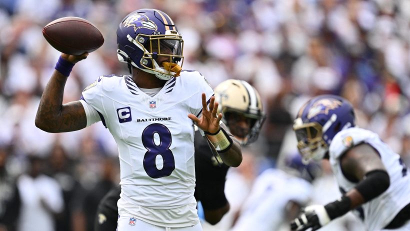 Lamar Jackson drops back to throw vs the Saints.