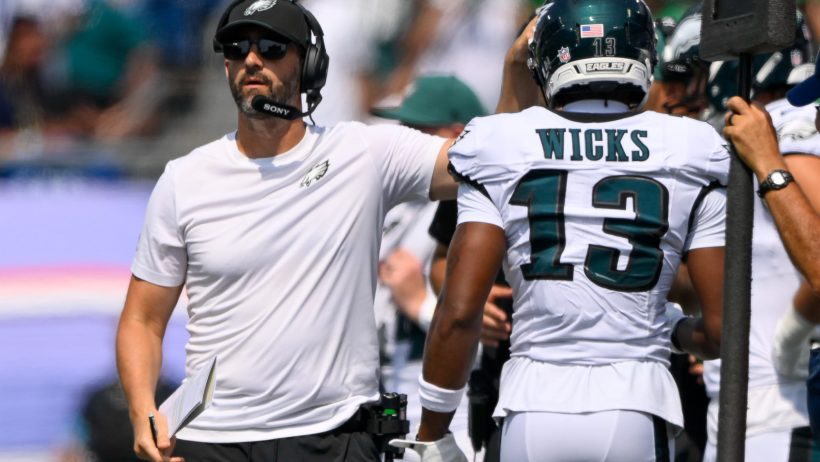 Dontayvion Wicks walking to the sideline