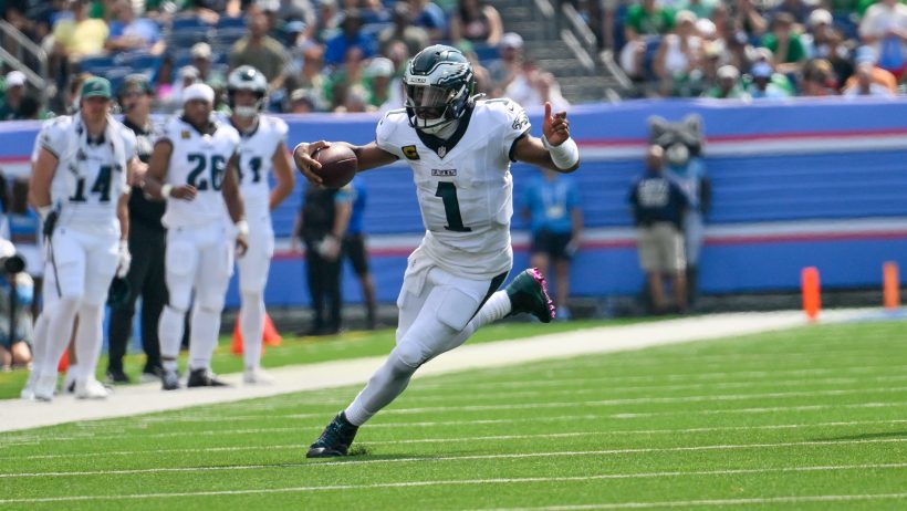 Philadelphia Eagles quarterback Jalen Hurts running with the ball