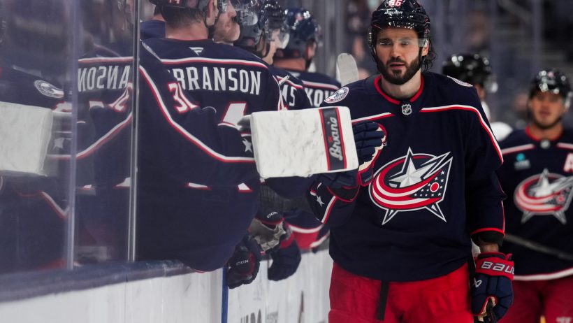 Kirill Marchenko celebrates a goal with Columbus Blue Jackets teammates