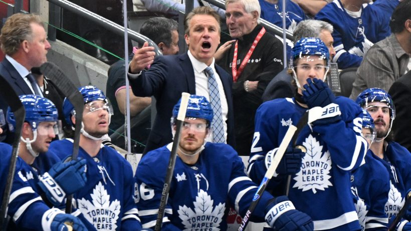 Jim Hiller behind the Maple Leafs bench during a game vs the Canadiens.
