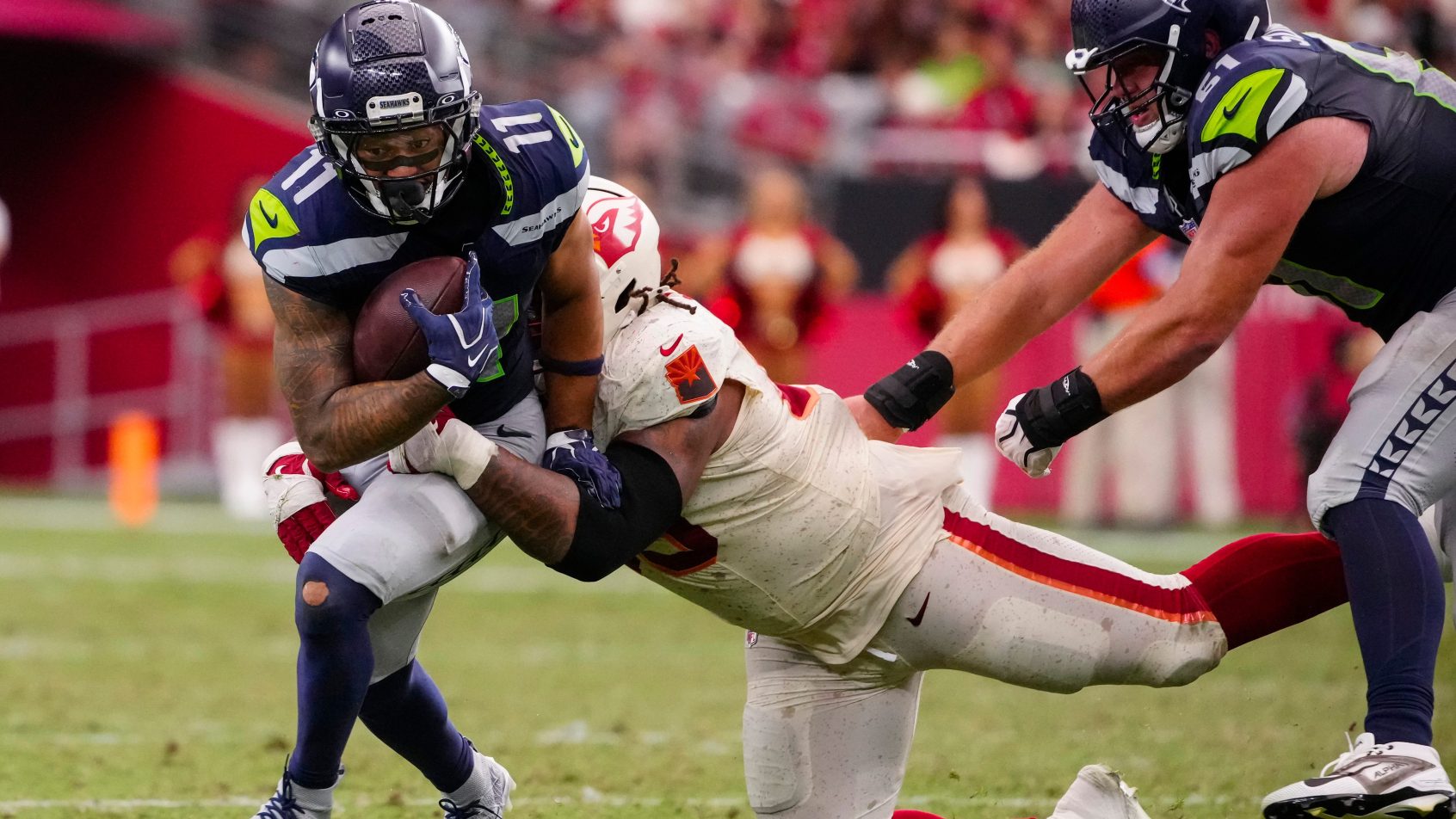 Jaxon Smith-Njigba runs after a catch against Arizona ahead of NFL Week 3