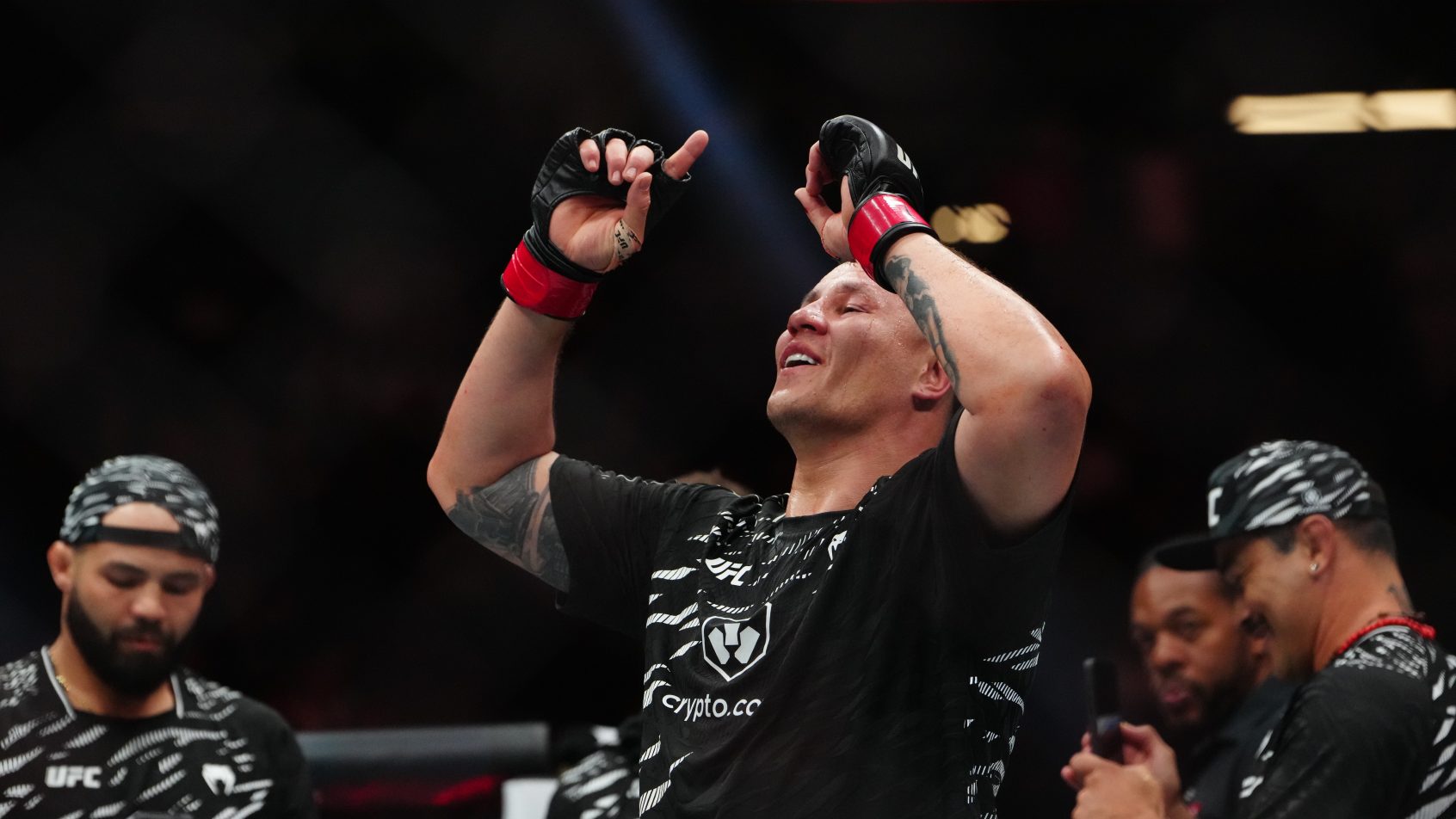 Jhonata Diniz celebrates a victory at UFC 317.