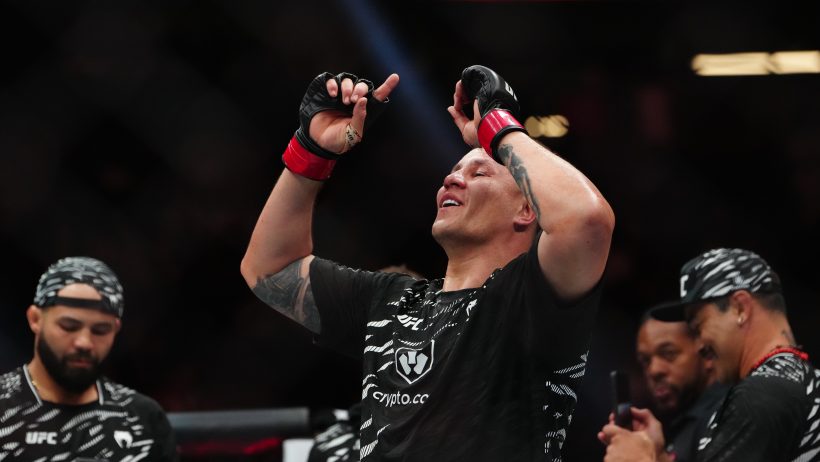 Jhonata Diniz celebrates a victory at UFC 317.