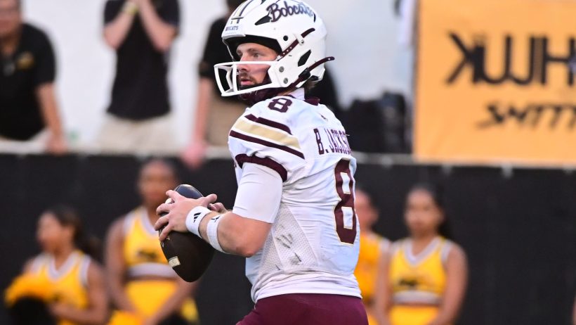 Texas State Bobcats quarterback Brad Jackson looks to pass