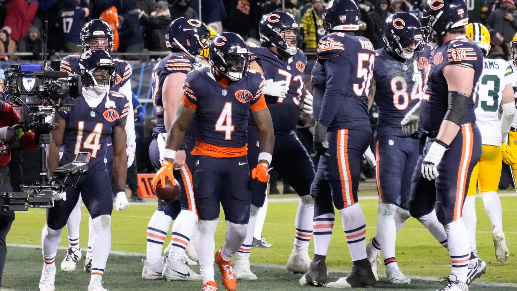 D'Andre Swift scores a touchdown against the Packers.