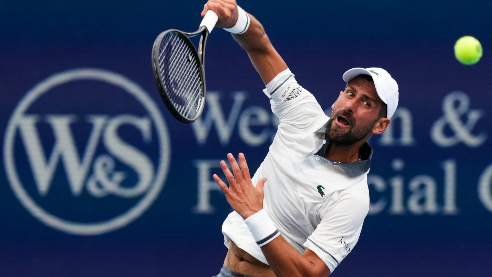 Novak Djokovic serves in a match at the Cincinnati Open.