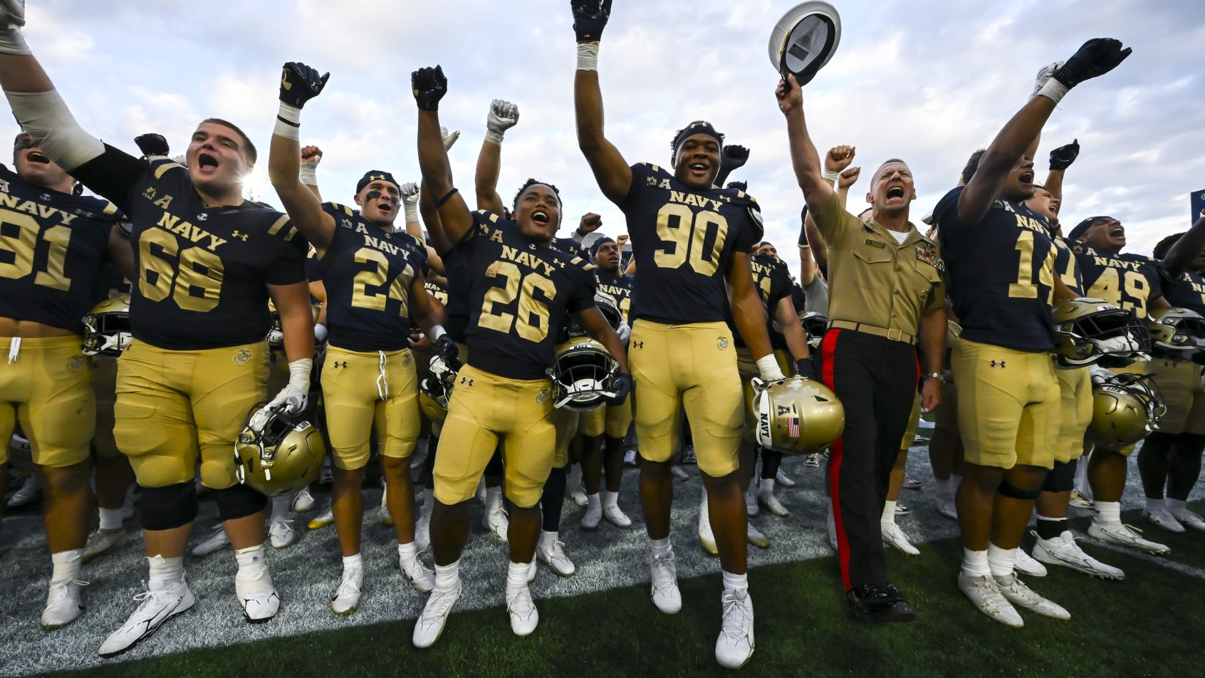 Navy Midshipmen celebrate their win over Towson at Navy-Marine Corps Memorial Stadium