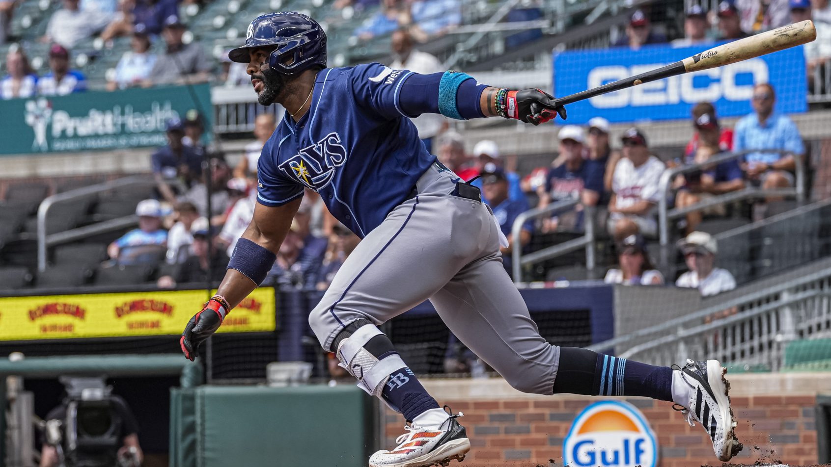 Yandy Diaz slaps a hjit vs the Braves.