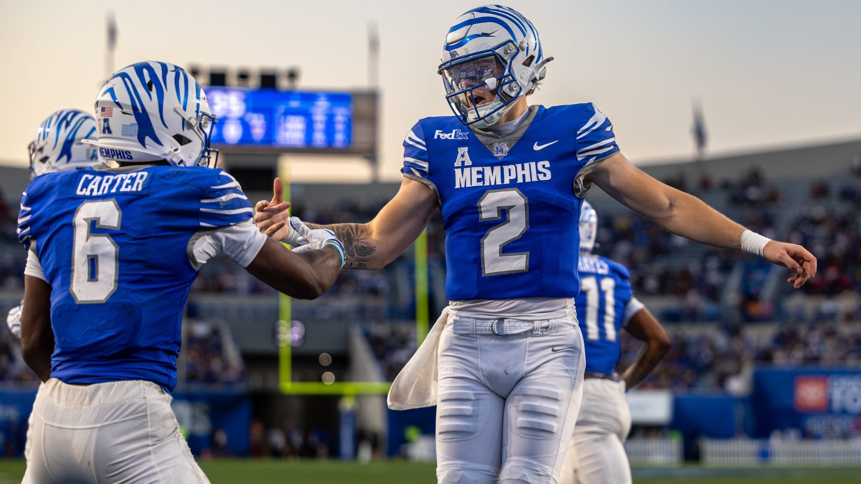 Marcus Stokes and Jaylin Carter celebrate after a touchdown in Memphis vs UT Martin
