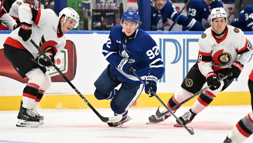 Gavin McKenna is tripped up by the Senators in the neutral zone.