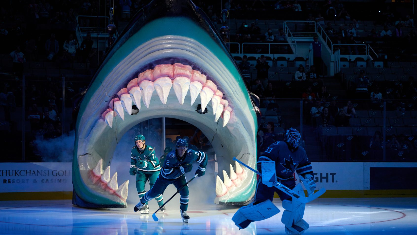 San Jose Sharks players Macklin Celebrini, Will Smith and Alex Nedeljkovic skate onto the ice at SAP Center