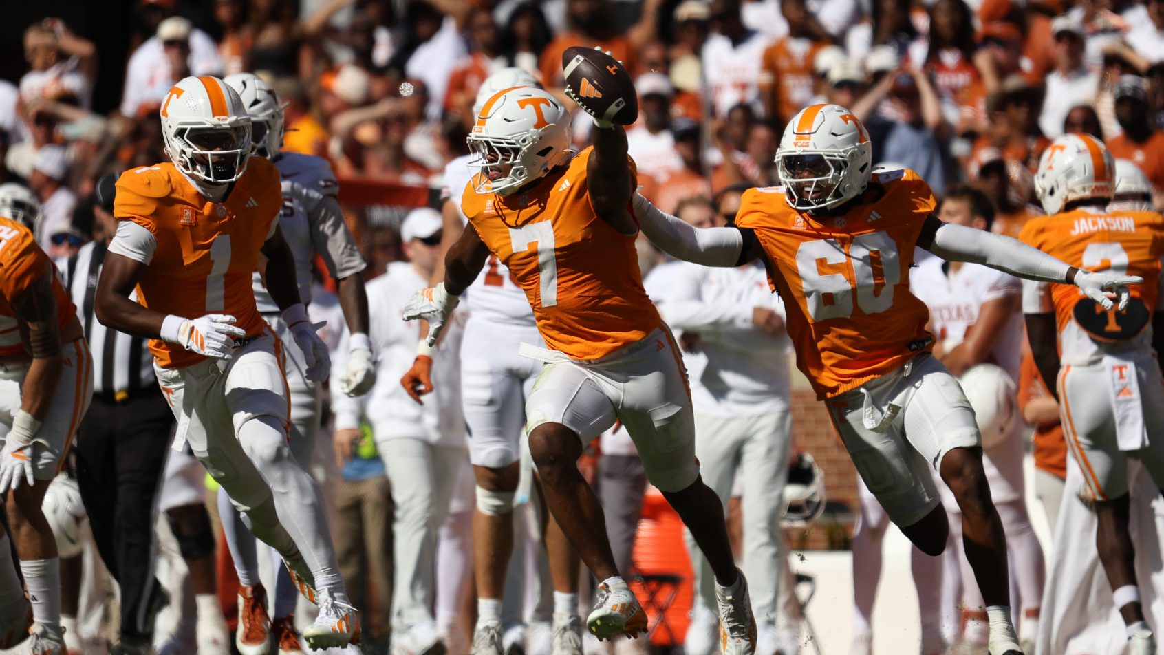 Texas celebrates during a game vs Tennessee.