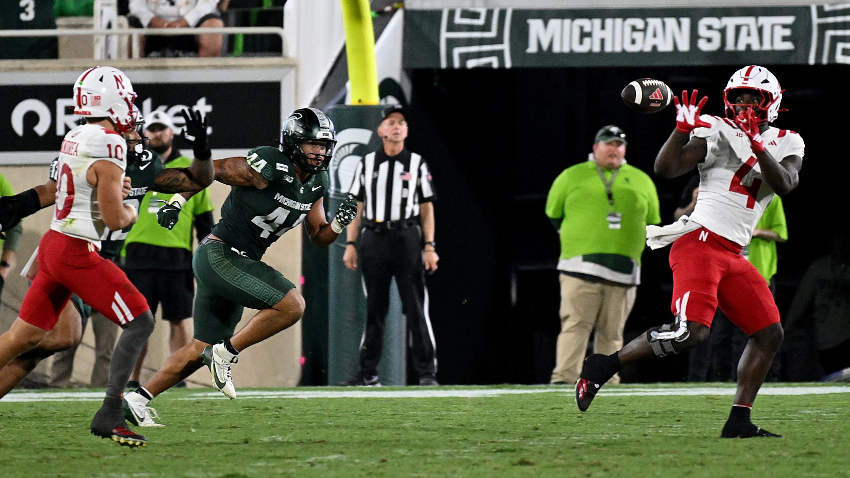 Nebraska quarterback Anthony Colandrea passes against Michigan State