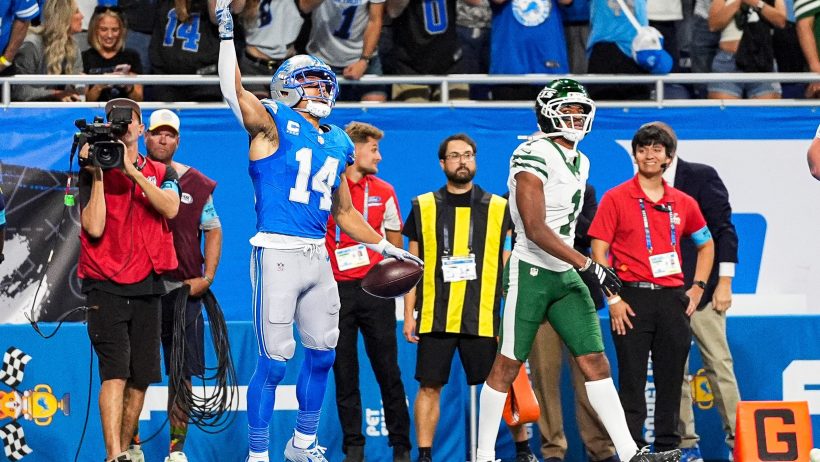 Amon-Ra St. Brown celebrates a touchdown.