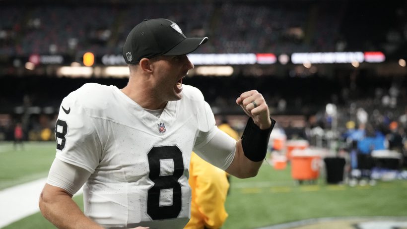 Kirk Cousins celebrating coming off the field after a win vs the Saints