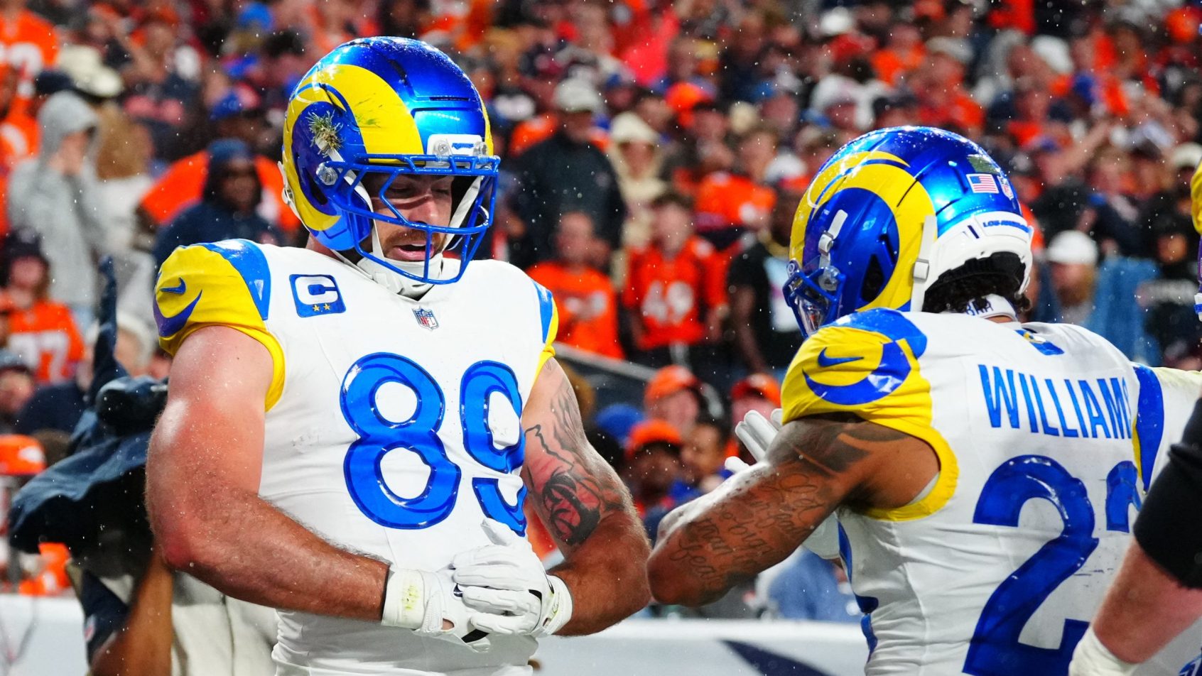 The Rams celebrate a touchdown vs the Broncos.