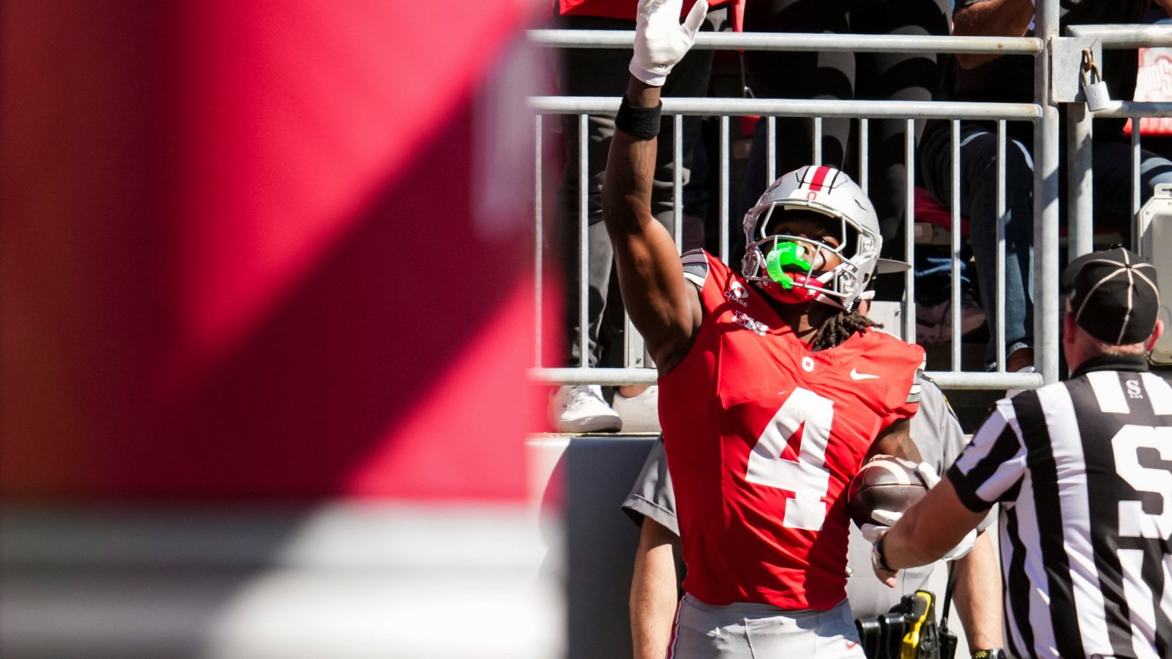 Ohio State receiver Jeremiah Smith celebrates a touchdown against Illinois