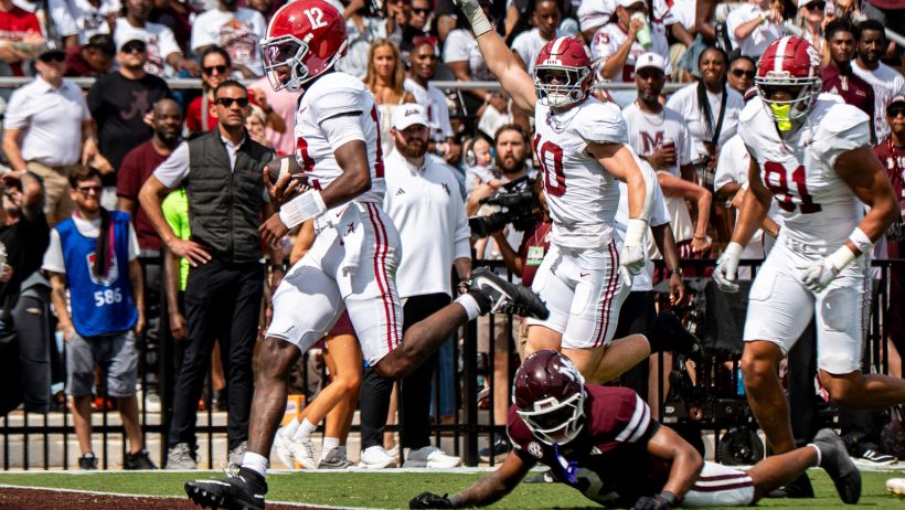 Alabama quarterback Keelon Russell runs for a touchdown against Mississippi State
