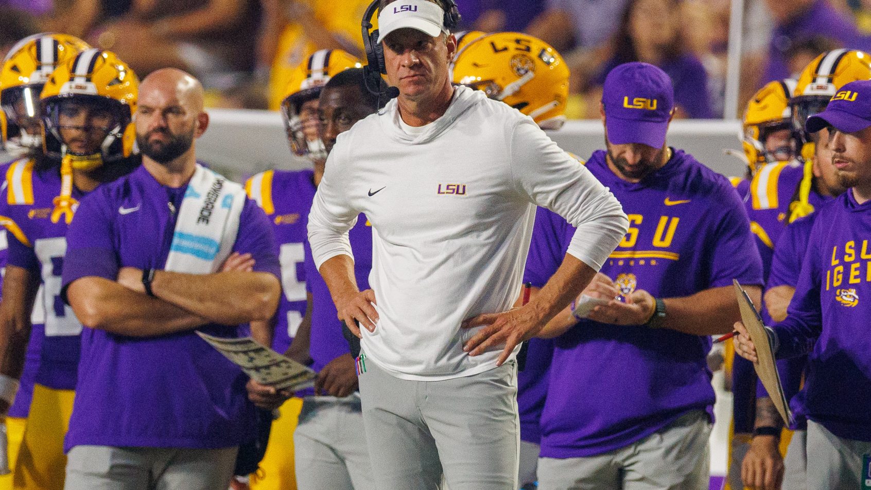 LSU Tigers head coach Lane Kiffin watches their game.
