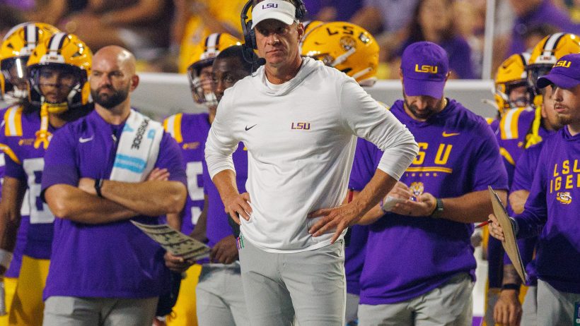 LSU Tigers head coach Lane Kiffin watches their game.