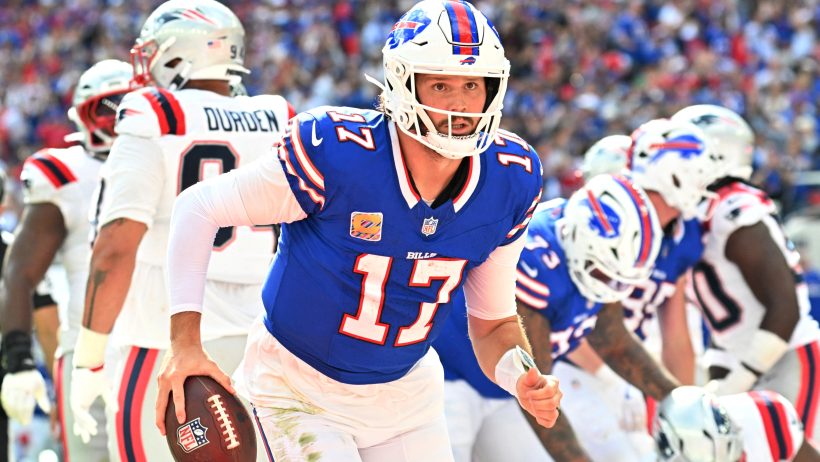 Josh Allen scores a touchdown against the Patriots.