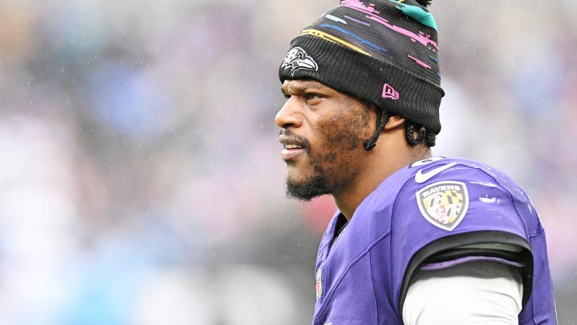 Lamar Jackson on the sidelines during a win over the Titans.