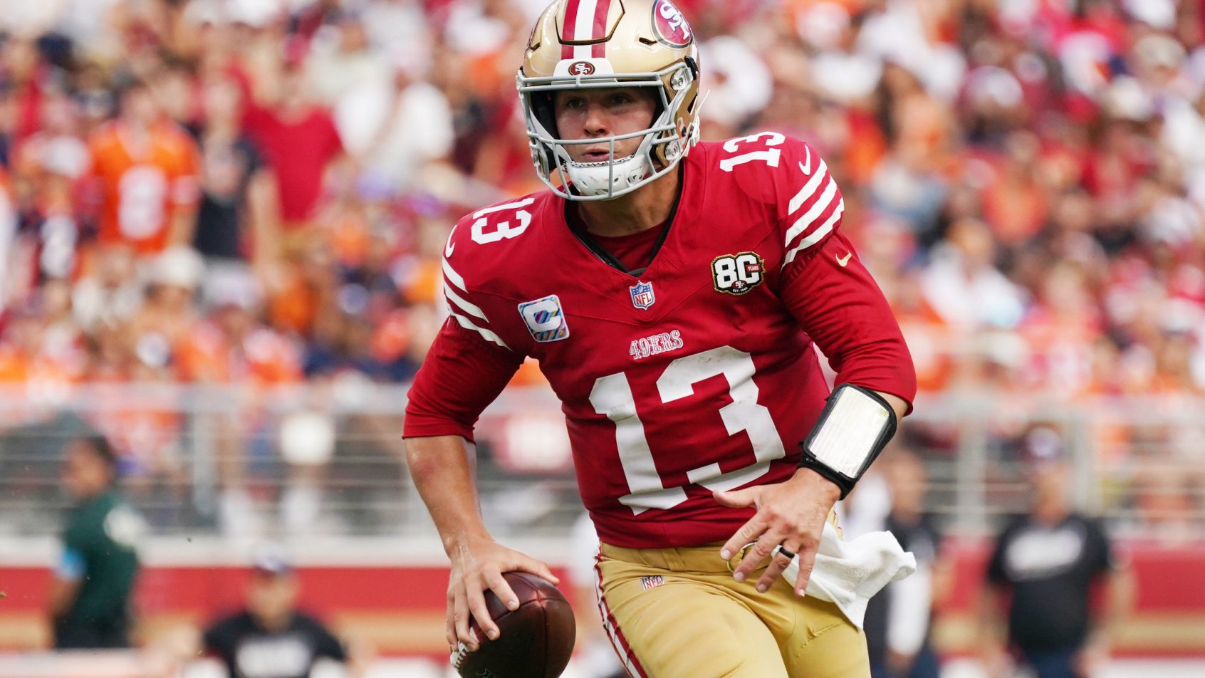 San Francisco 49ers quarterback Brock Purdy running with the ball