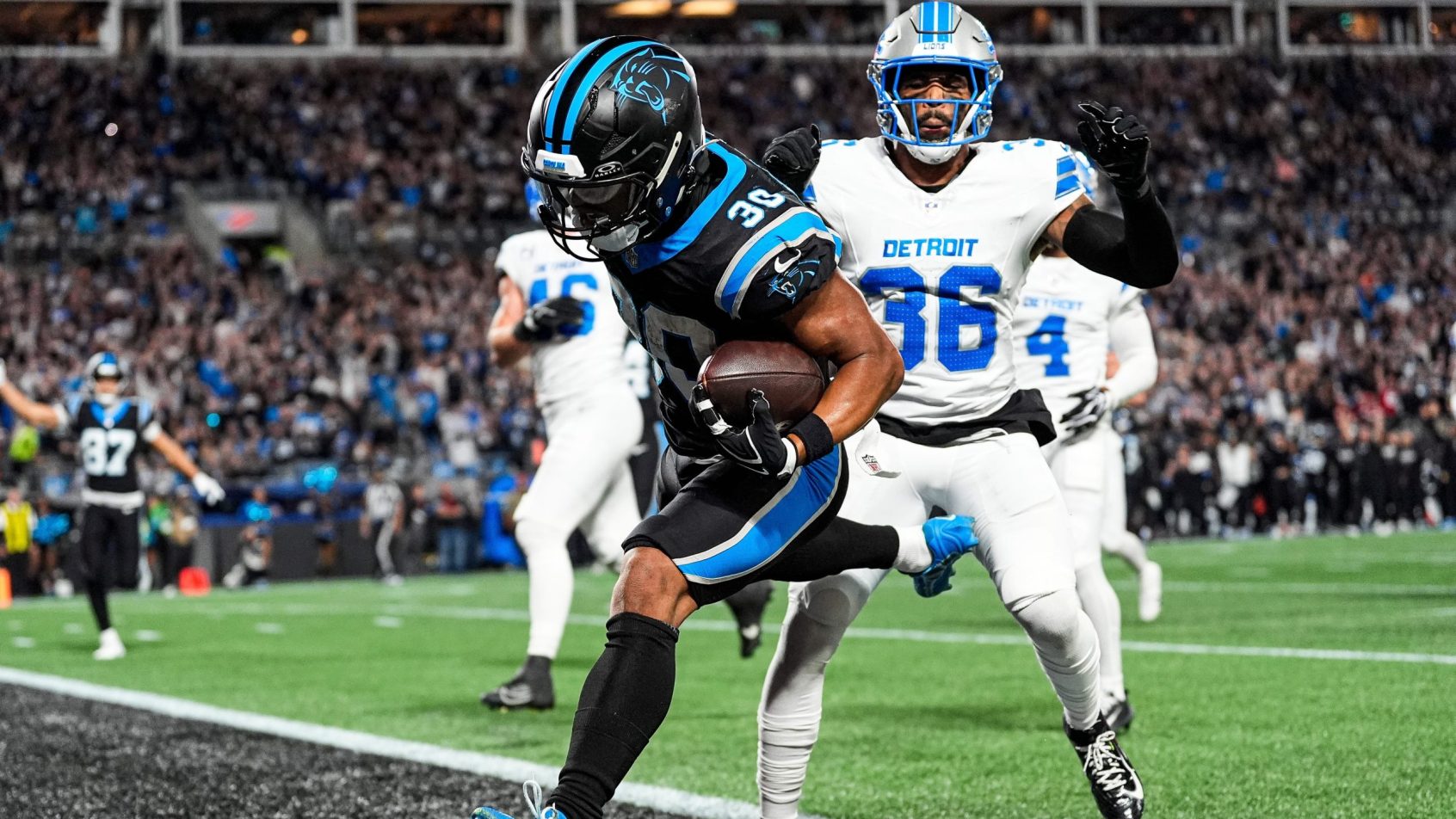 Chuba Hubbard scores a touchdown vs the Lions.