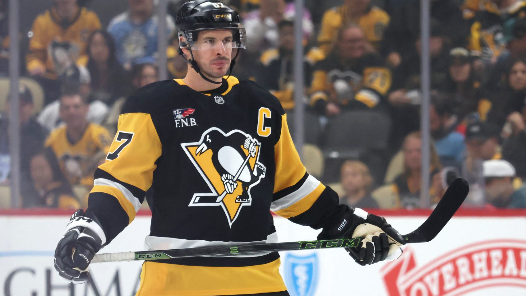 Sidney Crosby before a face-off in a game vs the Jets.