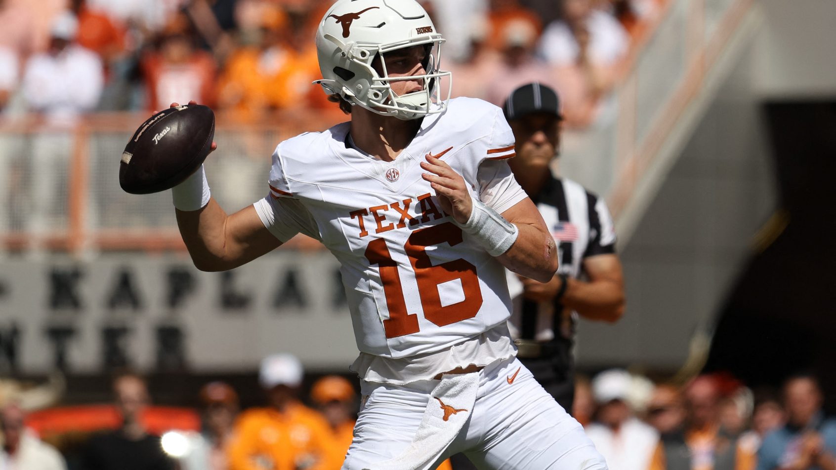 Texas quarterback Arch Manning passes against Tennessee at Neyland Stadium