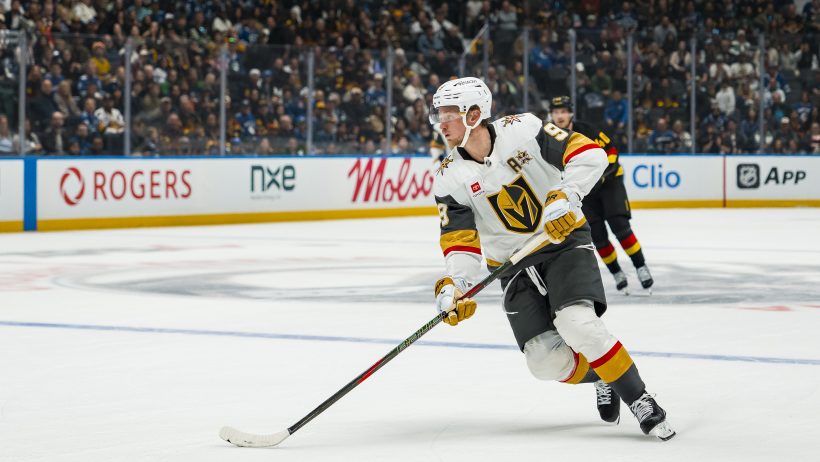 Jack Eichel stickhandles the puck.