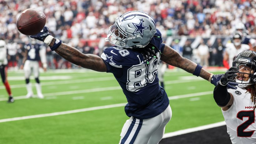 Ceedee Lamb tries to make a catch.