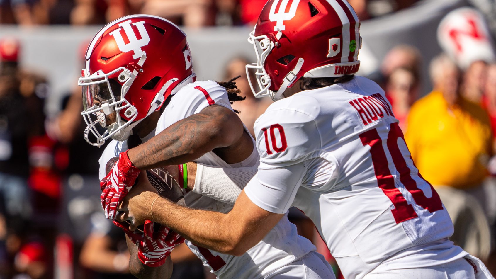 Indiana quarterback Josh Hoover hands off to Turbo Richard against Nebraska
