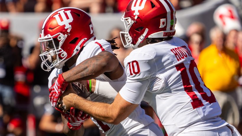 Indiana quarterback Josh Hoover hands off to Turbo Richard against Nebraska