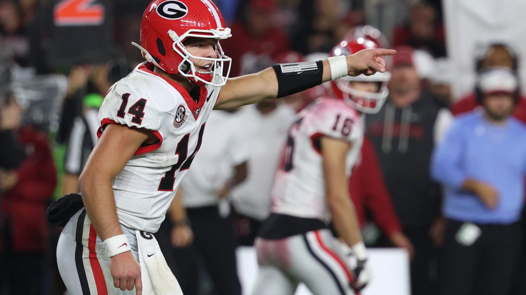 Gunner Stockton pointing at line of scrimmage