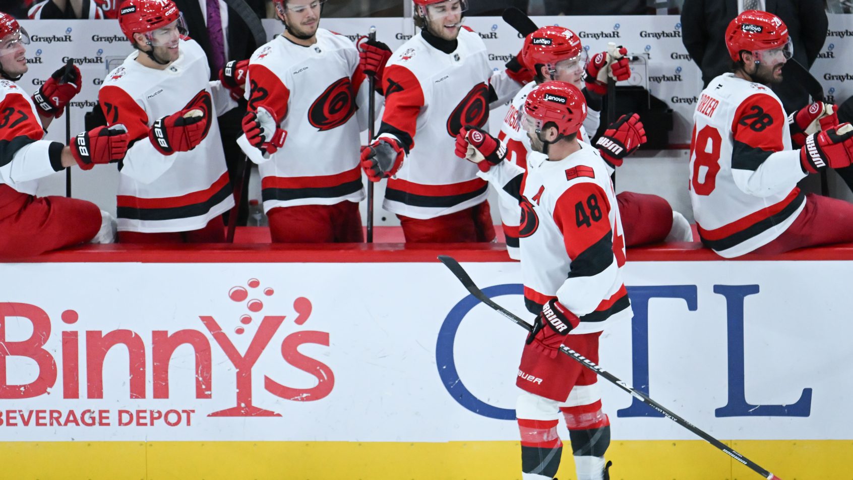 Jordan Martinook celebrates with teammates