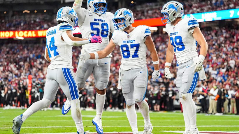 Detroit Lions players celebrating a touchdown in the 2026 NFL season.