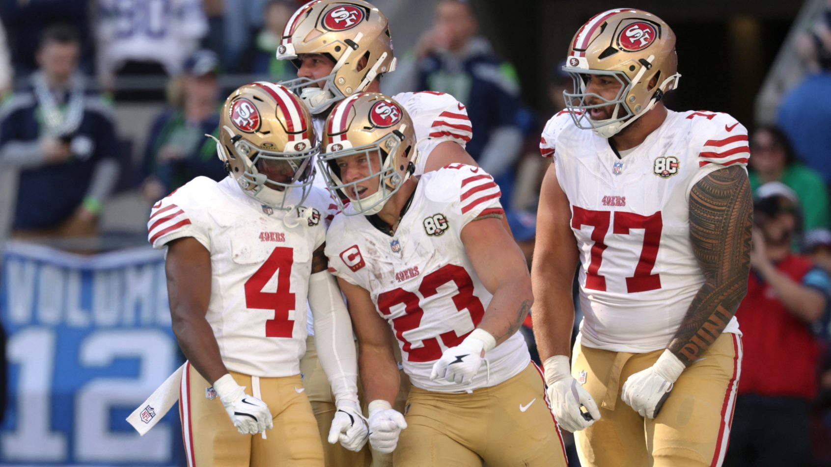 Christian McCaffrey TD celebration with teammates