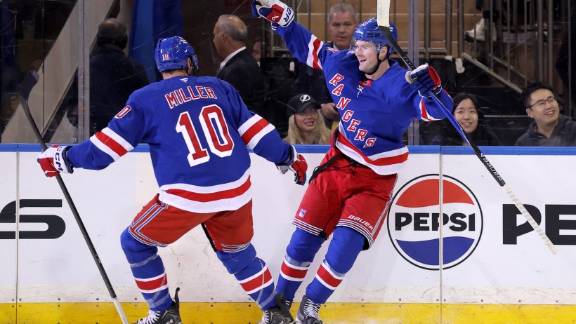 Alexis Lafreniere celebrates a goal against the Lightning.