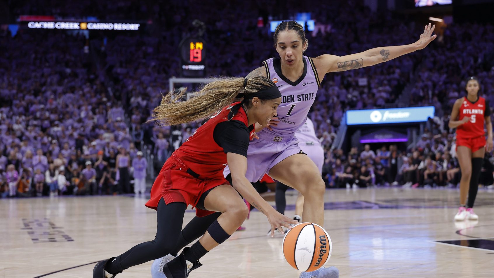 Jordin Canada drives to the hoop vs the Valkyries.