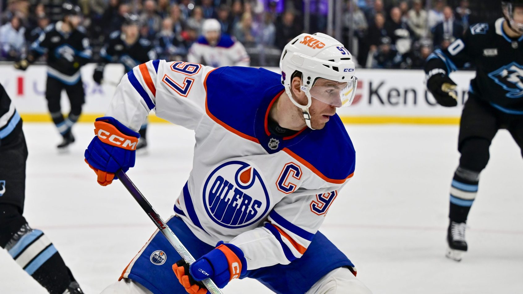 Connor McDavid controls the puck in a game vs the Mammoth.