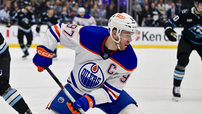 Connor McDavid controls the puck in a game vs the Mammoth.