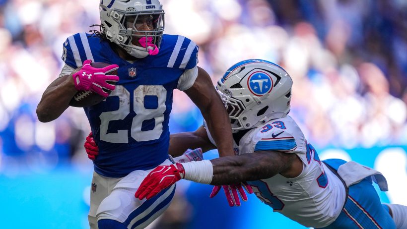 Jonathan Taylor running the ball against the Titans