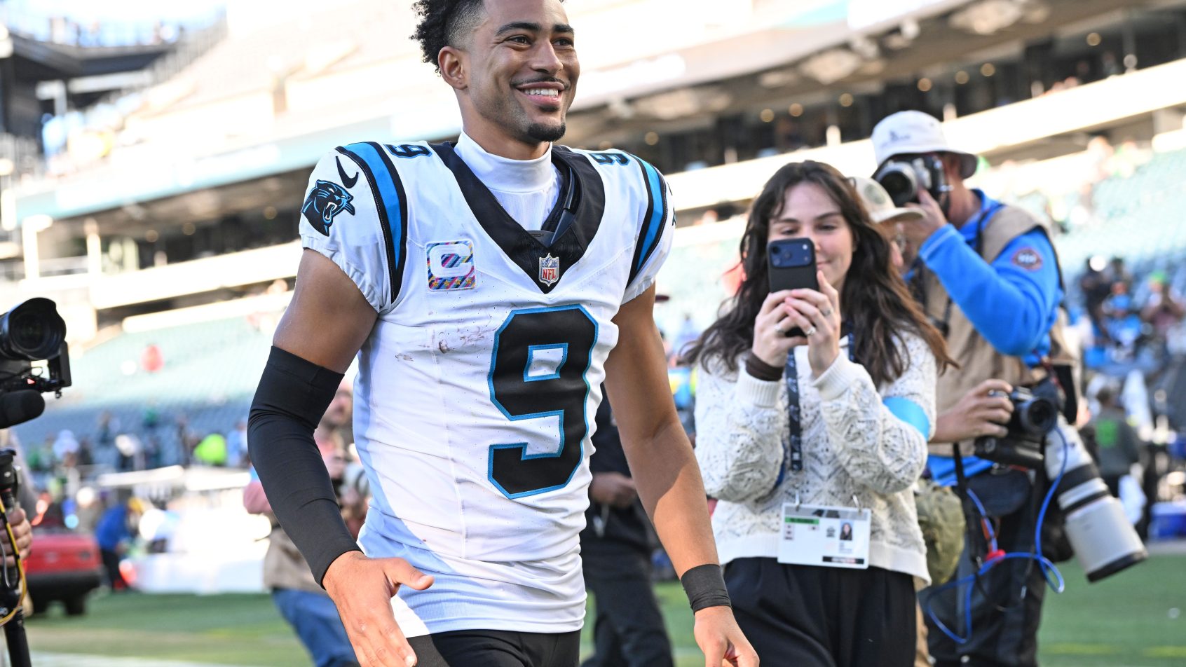 Bryce Young walks off the field.