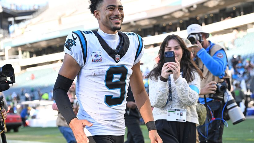 Bryce Young walks off the field.
